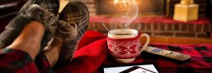 Resting at a lit Chimney with feet up enjoying a coffee and putting down the phone and tablet while the Mortgage agent does a great Job getting the Mortgage approved